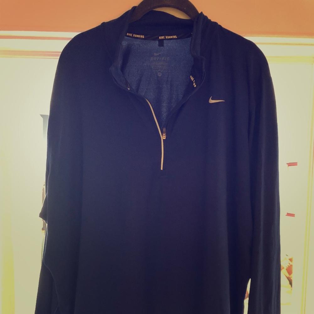 Nike woman’s half zip running top